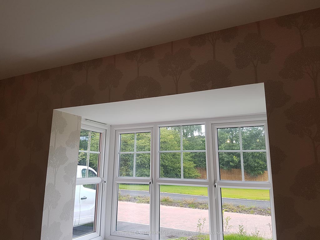window had wallpaper applied
